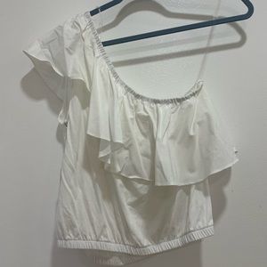 One shoulder, white top